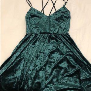 Strappy back green velvet dress